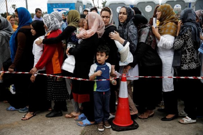 EU proposes scheme to share out asylum seekers
